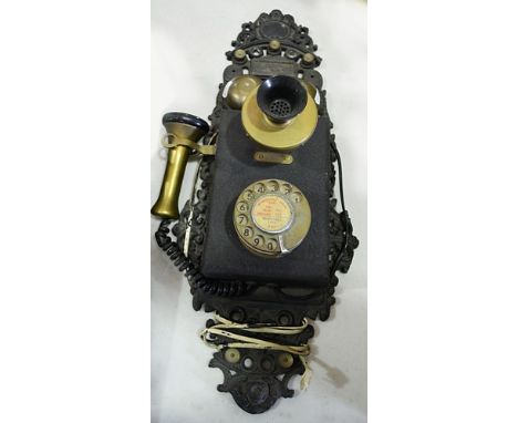 Vintage style wall mounted telephone, cast back 59cm.