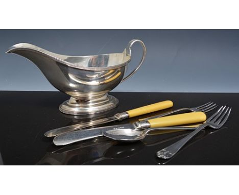 Silver sauceboat, London 1923, reeded outlines, 4oz, 10cm, two small silver forks, two silver teaspoons and a set of stainles