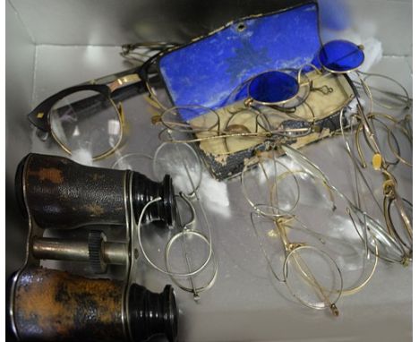 Pair of opera glasses, and a collection of vintage spectacles.