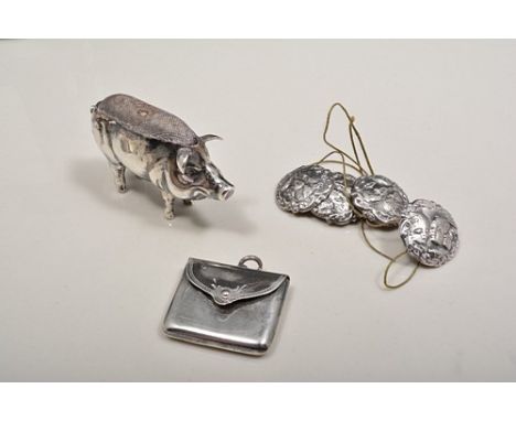 Edwardian silver novelty pin cushion, designed as a pig, Birmingham 1906, length 5cm, a silver envelope shape stamp case and 