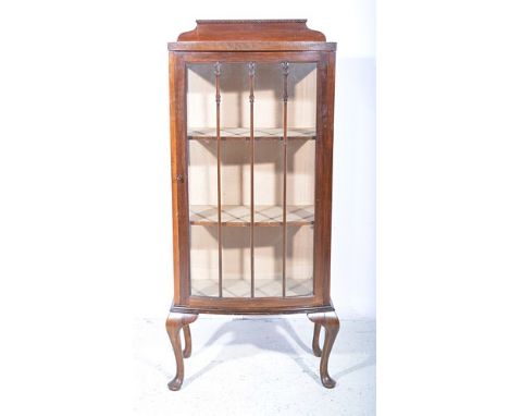 Stained wood bow front china cabinet, single drawer enclosing fabric lined drawers on cabriole legs, width 57cm.