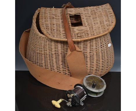 Fishing:  Allcocks Marvel 4" reel, other reels and accessories in a fishing basket.