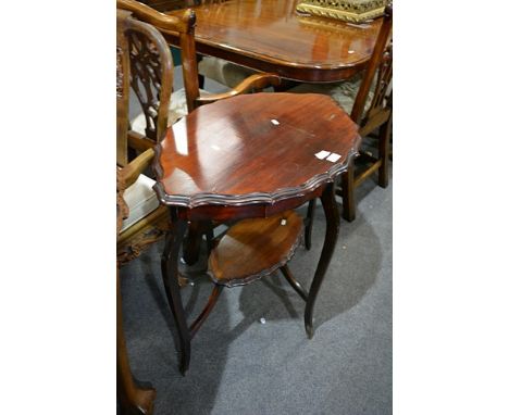 Edwardian walnut window table, cabriole legs with a shelf.