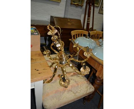 Contemporary lacquered brass and silvered eight light chandelier, scrolled branches, 64cm drop.