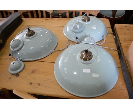Three contemporary celedan coloured ceramic centre light fittings, diameter 39cm.