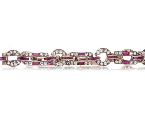 RUBY AND WHITE SAPPHIRE BRACELET set with circular and rectangular sections, each set with round white sapphires and calibre 