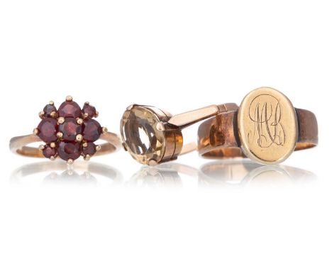 GARNET CLUSTER RING  ALONG WITH TWO OTHERS including a citrine ring and a signet ring, the signet ring unmarked, the others i