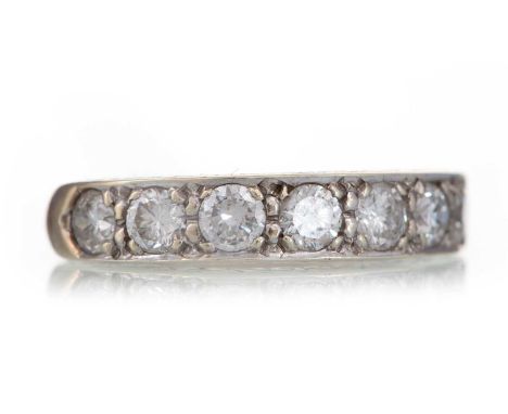 DIAMOND SEVEN STONE RING set with round brilliant cut diamonds totalling approximately 0.70 carats, unmarked, size I 1/2Qty: 