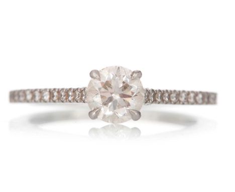 CERTIFICATED DIAMOND SOLITAIRE RING  set with a round brilliant cut diamond of approximately 0.73 carats, with accompanying o