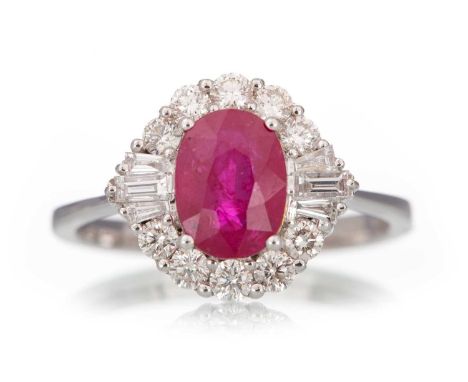 CERTIFICATED RUBY AND DIAMOND RING set with an oval ruby of approximately 1.75 carats, within a halo of diamonds totalling ap