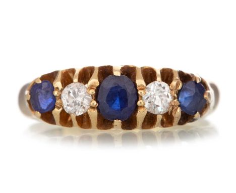 SAPPHIRE AND DIAMOND RING set with alternating sapphires and diamonds, in eighteen carat gold, size J 1/2Qty: 3.5g