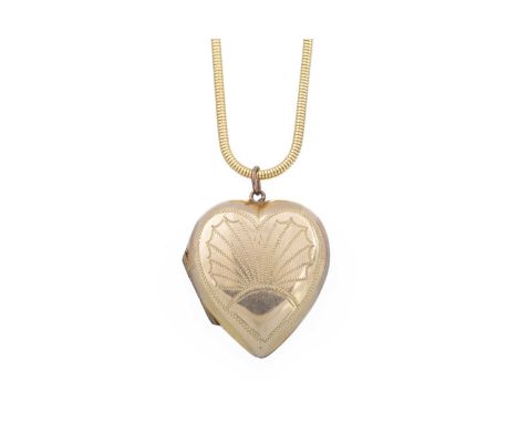 HEART SHAPED LOCKET ON CHAIN the locket with engine turned decoration, nine carat gold back and front, on an eighteen carat g