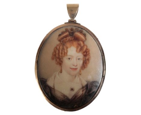 AN EARLY 19TH CENTURY PORTRAIT MINIATURE depicting a finely dressed woman with auburn hair, in an unmarked yellow metal mount