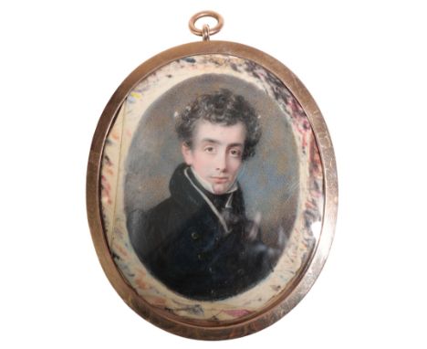 A 19TH CENTURY PORTRAIT MINIATURE OF A YOUNG GENTLEMAN with inscription to the reverse, in an unmarked yellow metal mount, 8.