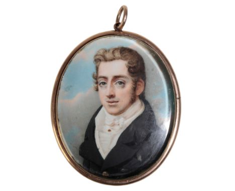 A GEORGE III PORTRAIT MINIATURE Late 18th/early 19th century, depicting a young gentleman, in an unmarked yellow metal mount,