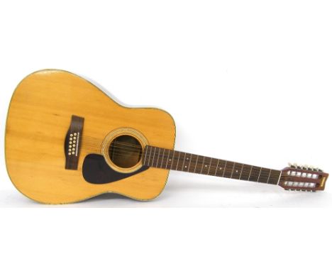 Yamaha FG-312 twelve string acoustic guitar, made in Taiwan; Back and sides: mahogany, scratches and minor impact blemishes; 