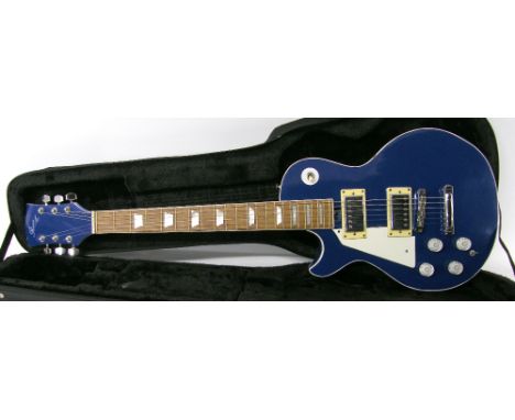 1985 Reeve left-handed Les Paul style electric guitar, made in England; Finish: blue, scratches and other blemishes; Fretboar