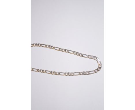 A silver curb chain 