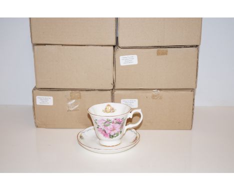 A collection of 6 Royal Stafford cups and saucers with COA's queen mother flowers 