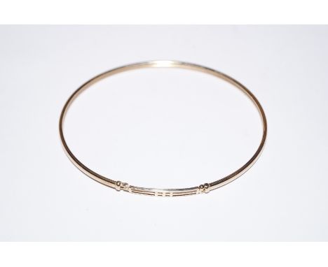A 9ct Gold bangle 
