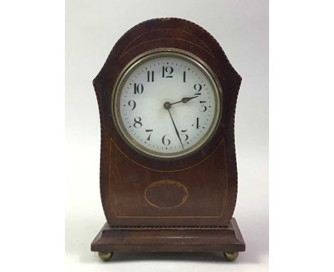 EDWARDIAN MAHOGANY MANTEL CLOCK, AND AN OAK MANTEL CLOCK the Edwardian clock with Arabic numeralsQty: 2