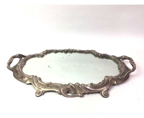 SILVER PLATED TRAY, LATE 19TH/EARLY 20TH CENTURY in the manner of WMF, the twin handled tray moulded with scroll and floral w