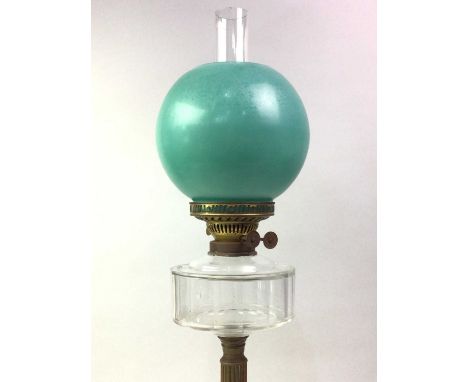 VINTAGE OIL LAMP, 20TH CENTURY on a raised black circular base, with green shade62cm high