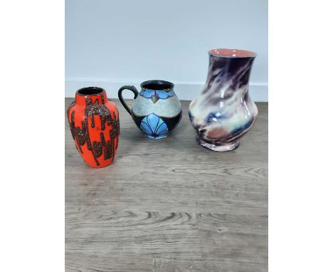 GROUP OF WEST GERMAN POTTERY VASES, ALONG WITH OTHER VASES  in various colours and styles tallest vase 43cm highThe second va