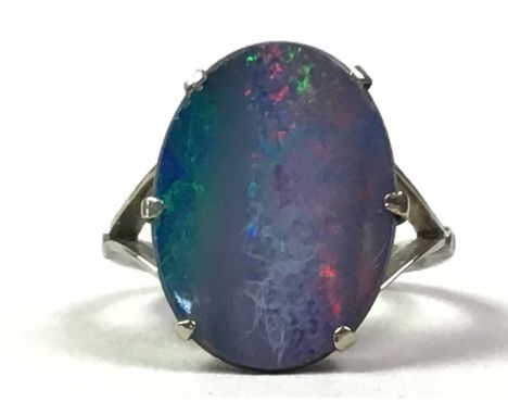 NINE CARAT WHITE GOLD AND TRIPLET OPAL RING, in boxRing is in generally worn condition, some scratches, ring is size N.