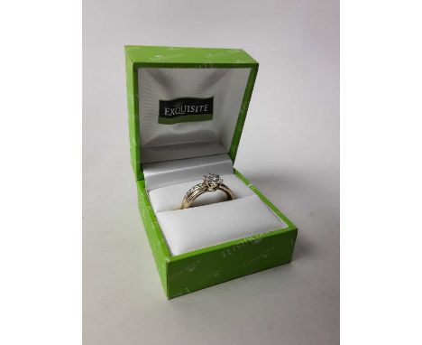 NINE CARAT GOLD DIAMOND CLUSTER RING, with diamond set shoulders