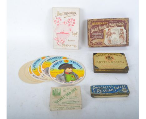 An assortment of early 20th century confectionary and cheese advertising of packaging to include paper and tin boxes. Brands 