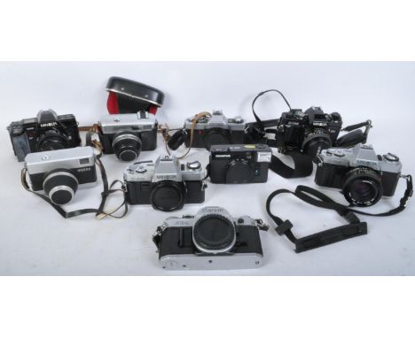 A collection of vintage 20th century camera's and camera equipment to include a Werra 1 camera, a Minolta X-700 camera body w