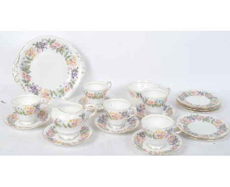 A vintage 20th century Paragon "Country Lane" fine bone china tea service by appointment to her Majesty The Queen. The lot to