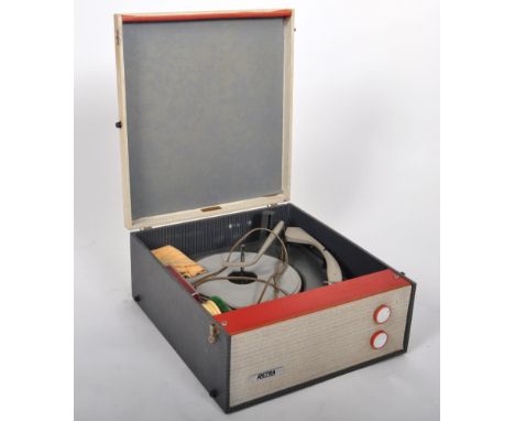 Retra - A retro portable record player having a cream and grey case with red highlights housing a Monarch turntable within. A