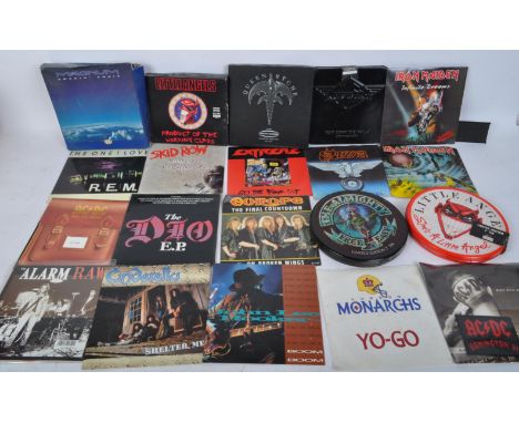 A collection of vintage 20th century Limited Edition 7" CD singles to include Black Sabbath Paranoid,John Lee Hooker Boom Boo