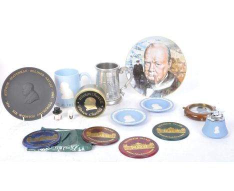 A collection of Winston Churchill items including; Wedgwood Jasperware lighter, a pewter jug (mug), wall decoration in the sh