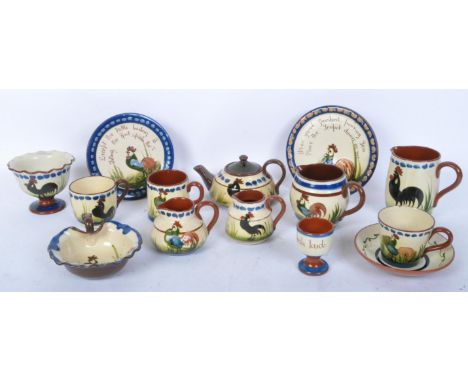 A 1970s 20th Century cockerel pottery tea service, comprising of; tea pot, cups, saucers. milk jug, water jug, egg cups. Mark