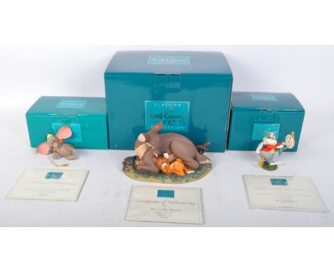 A collection of three 20th century Walt Disney Classics Collection ceramic figures. The lot to include "When I see an Elephan
