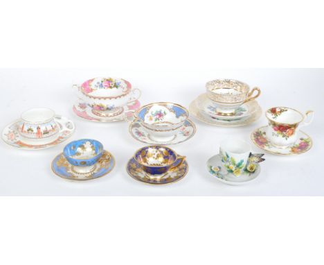 An assortment of vintage 20th century fine bone china cups &amp; saucers. The lot to include a Royal Albert "Country Roses" c