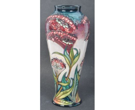 A vintage 20th century Moorcroft of England inverted baluster shaped vase in the "Gypsy" pattern after Rachel Bishop in green
