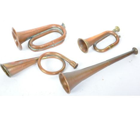 An assortment of Victorian 19th century copper &amp; brass hunting horns of conical shapes. The lot including examples of var
