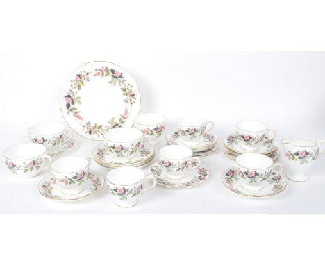 A vintage 20th century Wedgwood "Hathaway Rose" fine bone china England tea service of 21 pieces having floral decoration acr