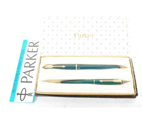 Two vintage mid 20th century circa 1960s Parker 17 lady fountain pen &amp; pencil in dark green acrylic cases. The fountain p