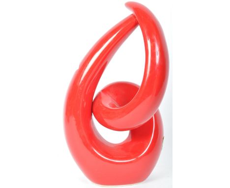 A retro vintage mid 20th Century c. 1960's red glazed spiral abstract sculpture / ornament. Measures approx 29cm tall.&nbsp;