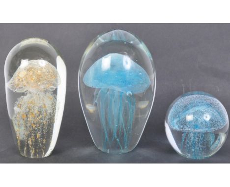 A collection of vintage 20th century glass jellyfish paperweights, each having a bubble control jellyfish to centre. Good con