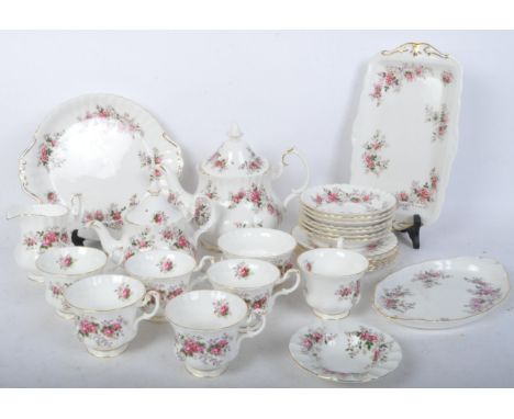 Royal Albert Lavender Rose fine bone china tea service. Comprising of tea pot, water pot, cups, saucers, serving platter, ser