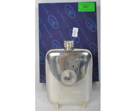 A 20th Century Pewter metal hip flask. With oval body, screw cap with a cockerel on the front. In original box. Measures appr