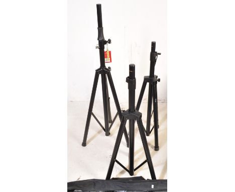 A pair of Stagg speaker stands in soft carry case together with a Stagg mic stand. Measures approx 127cm.