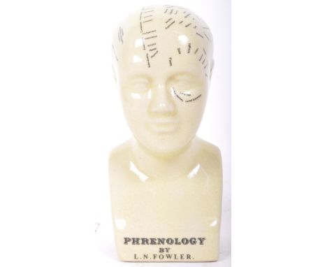 A vintage 20th century L. N. Fowler ceramic phrenology head bust having a beige ground with black lettering to surface. Measu