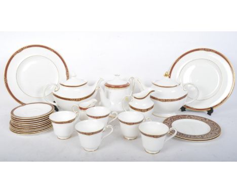 Royal Doulton - A vintage 20th century Royal Doulton bone china tea and dinner part service in the Tennyson pattern. The set 